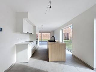 LIGGINGDit nieuwbouwproject langs de Cooppallaan, vlakbij het centrum van Wetteren, biedt 9 energiezuinige woningen in een hedendaagse architecturale...