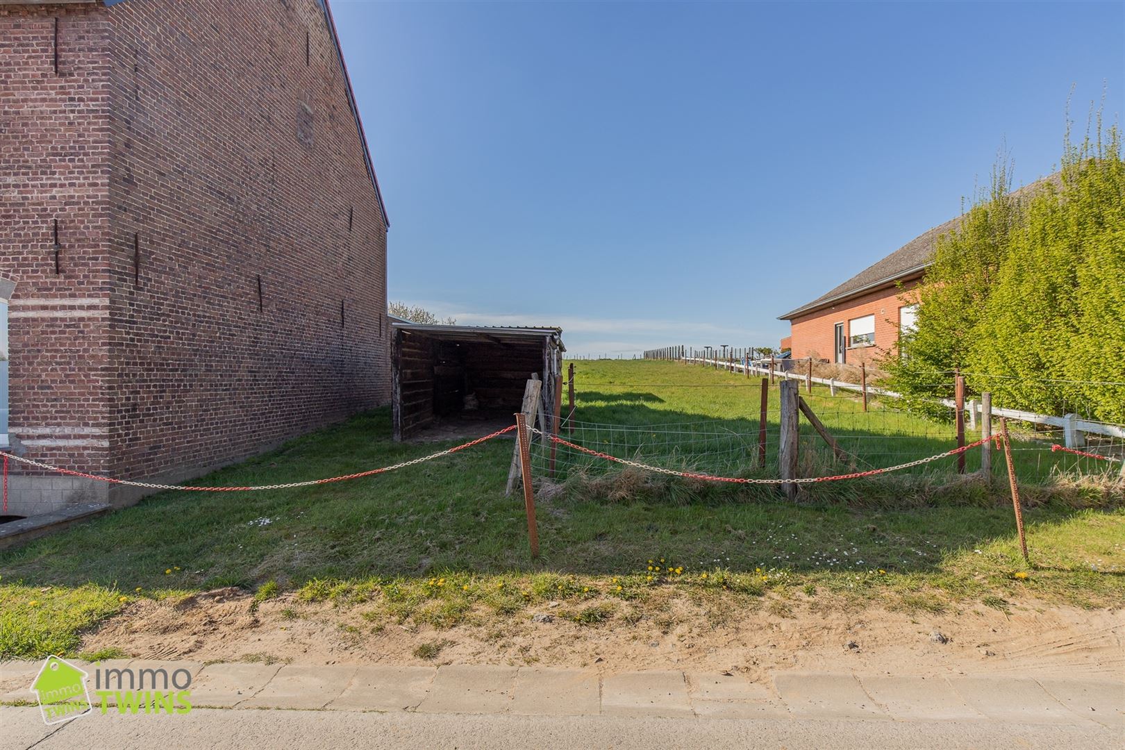 Bouwgrond halfopen bebouwing met weids groenzicht te Ninove - foto 5