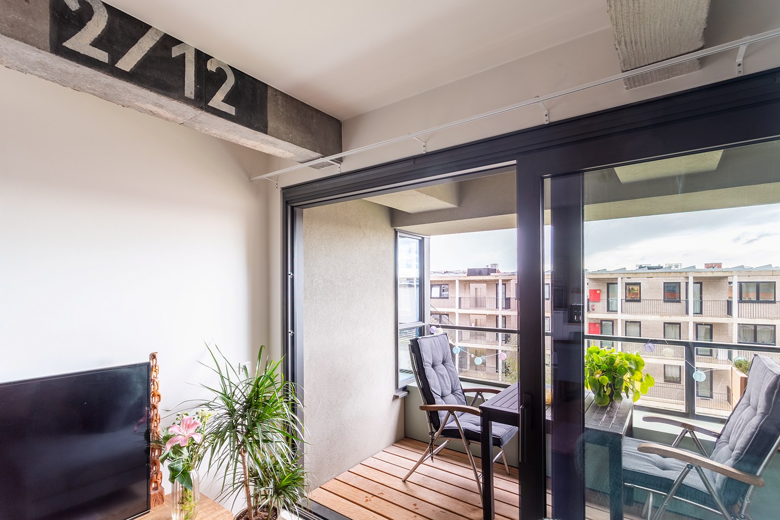 Stadsvibe en rust: energiezuinig appartement met terras - foto 4