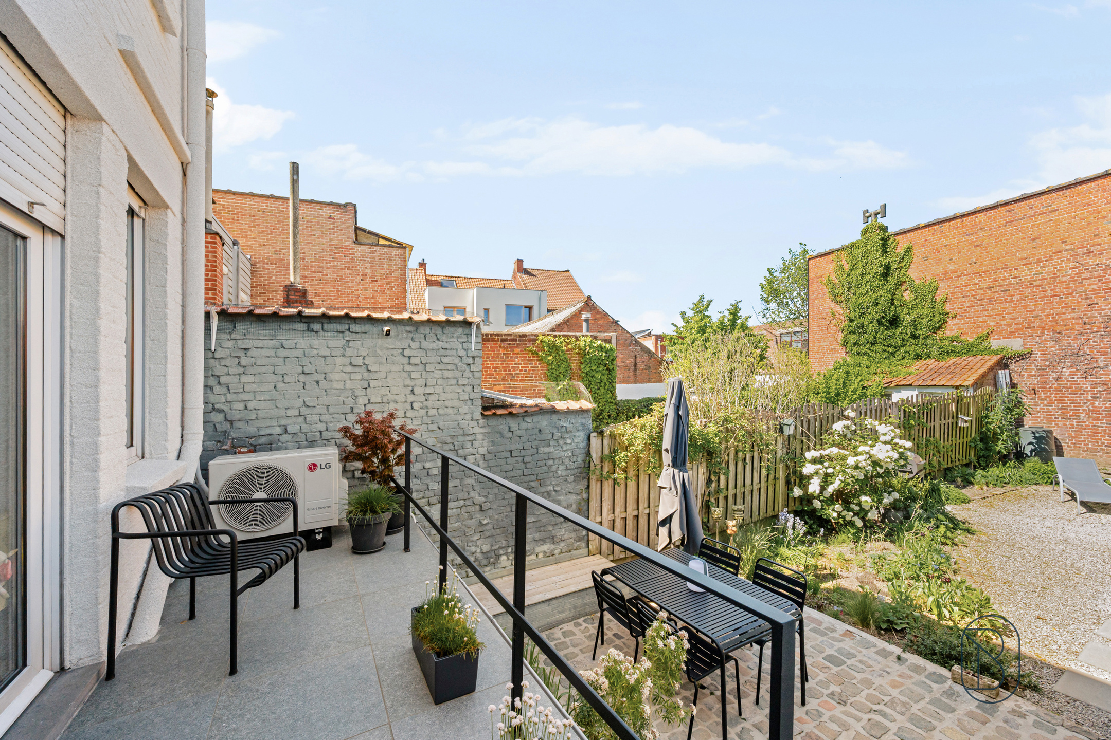 Instapklare woning met zonnige tuin in hartje Kortrijk - foto 4