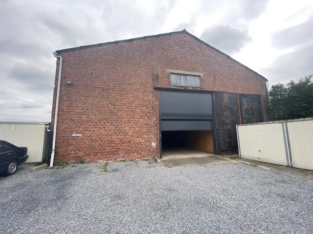 Staanplaats met stockageruimte in loods. - foto 2