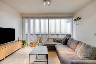 Ruim appartement met twee slaapkamers en zonnig terras op de 12de verdieping, gelegen naast Park Spoor Oost.Indeling:Het appartement bevindt zich op...