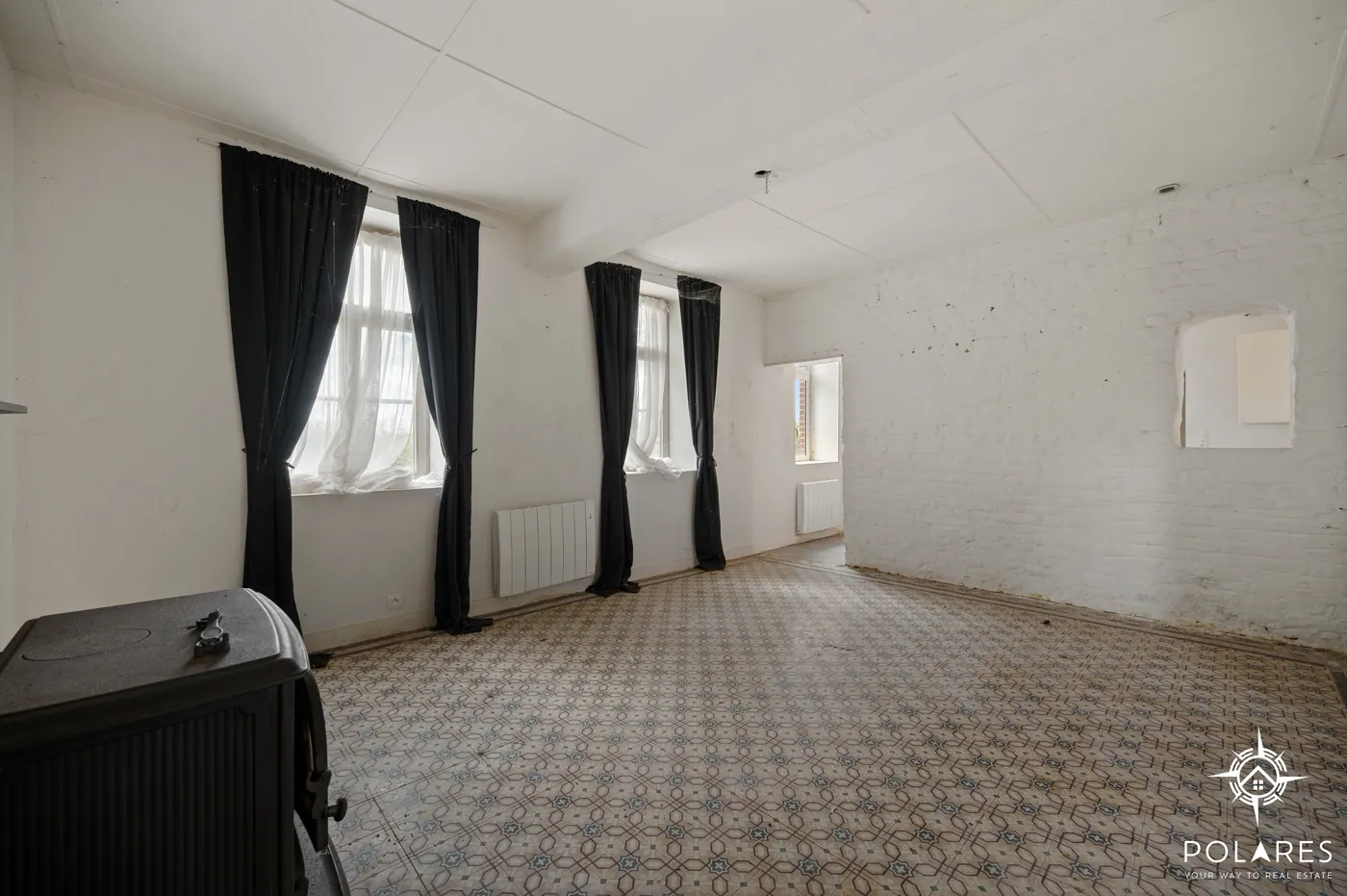 Te renoveren woning met ruime tuin en tal van mogelijkheden in Glabbeek - foto 4