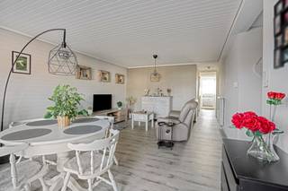 On the second floor of a small-scale residence with only six units, we find this tastefully renovated apartment. In 2015, the apartment was completely renovated from A to Z: windows, floors, electricity, plumbing, and finishing were all completely updated. An ideal home for personal use and an interesting investment.<br /><br />Upon entering, you arrive in the entrance hall, with a practical storage/laundry room with built-in cabinets on the right side. The bright living room with a semi-open kitchen is located at the front of the apartment and opens onto a cozy terrace through a sliding door.<br /><br />At the back, there is a spacious bedroom and a large dressing room. This last space can easily be converted into a second bedroom. The fitted bathroom has a sink, shower-bath combination, and toilet.<br /><br />Advantages<br /> x Completely renovated in 2015<br /> x Small-scale residence (only 6 units)<br /> x Bright living room with open kitchen<br /> x Possibility to take over furniture<br /> x Ideal for first-time buyers or investment<br /> x Not located in a flood-prone area (P and G score A)<br /><br />Does this property seem like something for you? Then quickly schedule a visit by calling 012 23 00 23 or ask your questions to roland@immo-leroi.be.