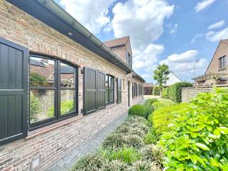 Aan 't Gaverke te Waregem: goed gelegen alleenstaande woning type 'fermette', dd. 1982, op een perceel van 700m², gekenmerkt door zijn...