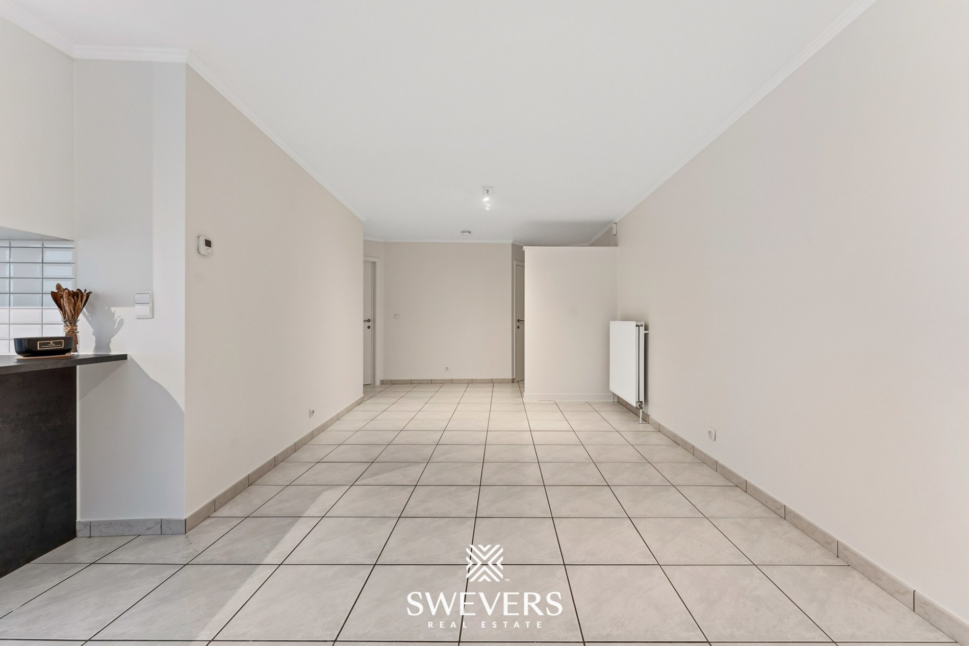 Ontdek dit instapklaar, energiezuinig en verrassend ruim gelijkvloers appartement in het charmante Zichem - foto 5