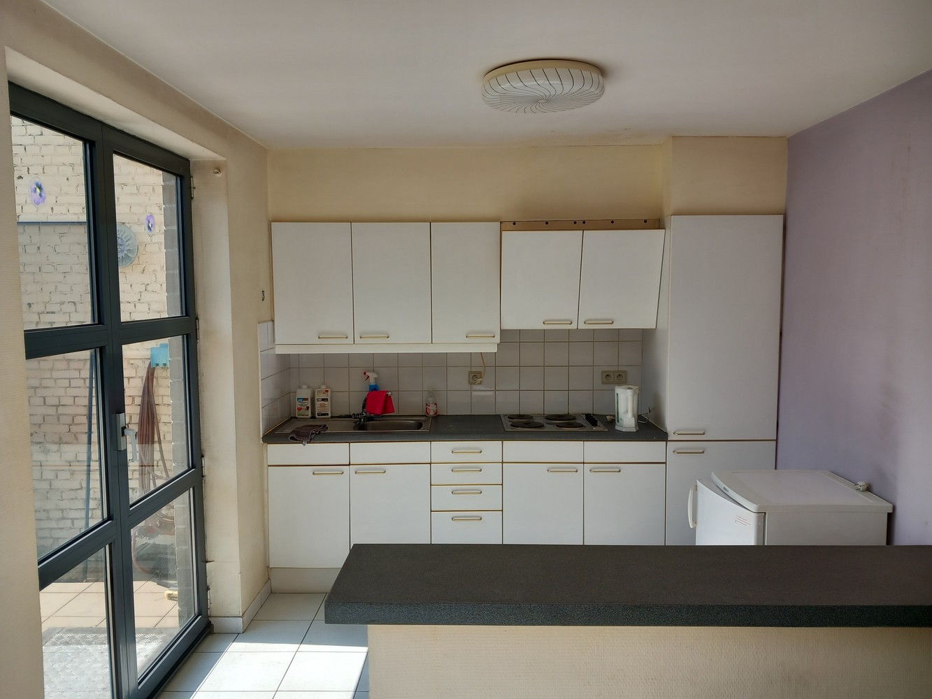 Gelijkvloers appartement met 2 slaapkamers en ruime tuin - foto 2