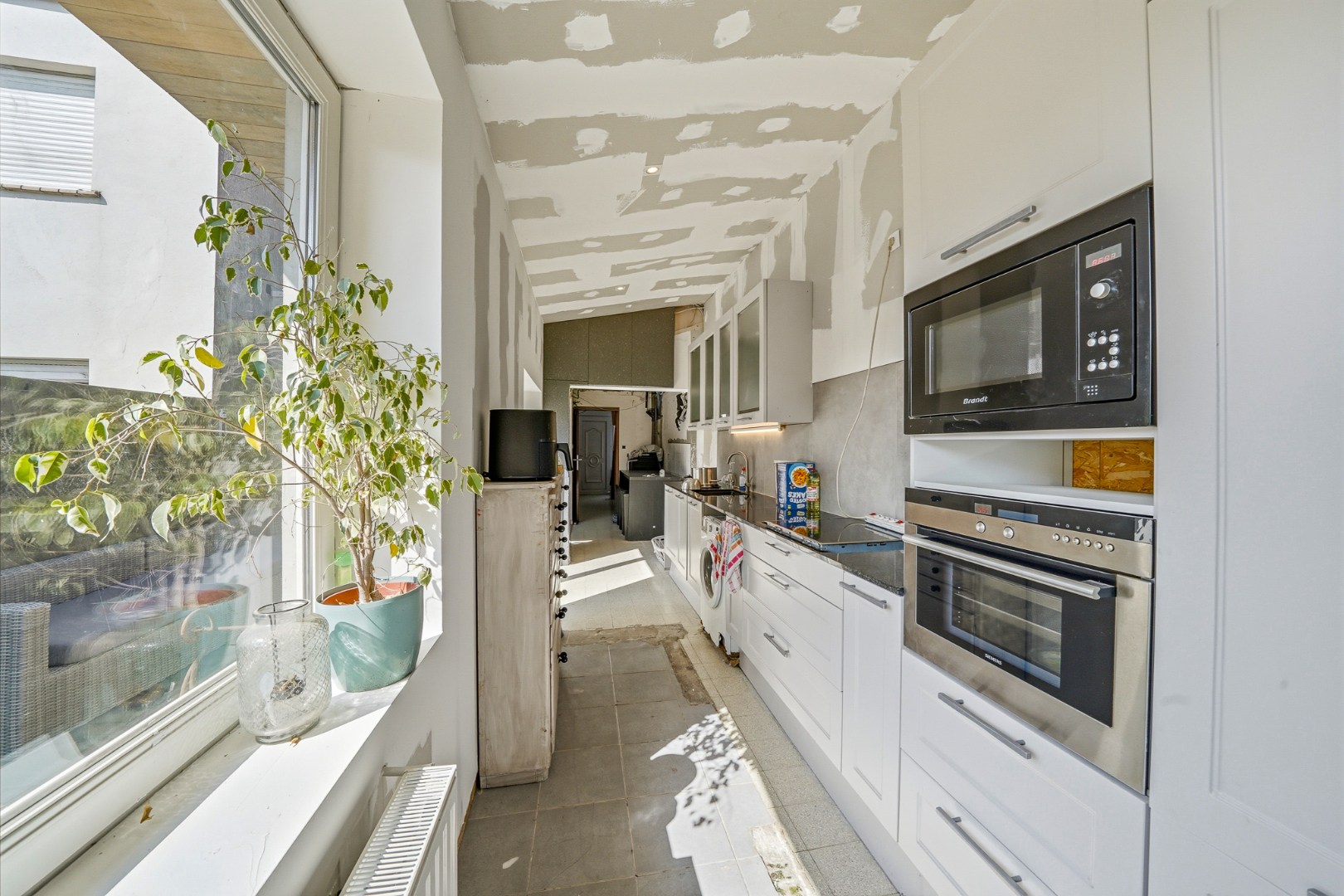 Te renoveren woning met ruime tuin in Bredene - foto 5