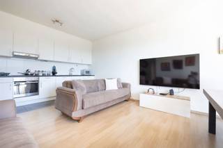 EVERE, NATO area, flat of ± 100m² with terrace of ± 4m² on the 4th floor. In good general condition, it consists of an entrance hall with...