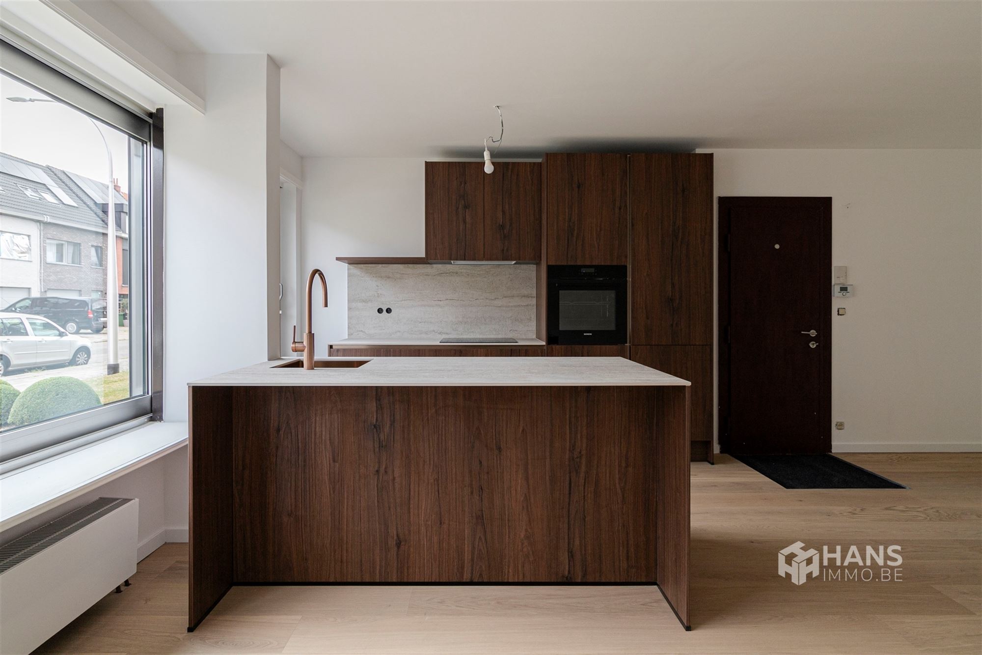 Gerenoveerd appartement (73m²) met 2 slaapkamers, garage en tuin in Boechout - foto 5