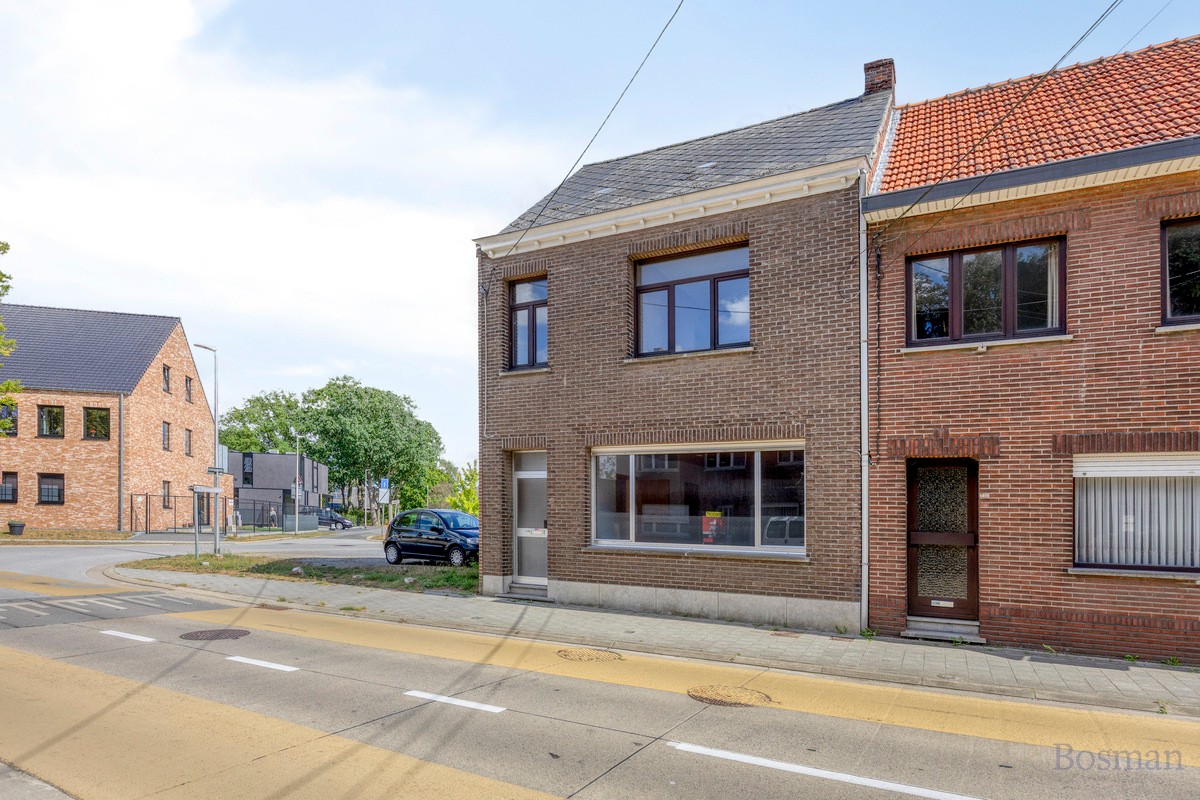 Halfopen bebouwing met 5 garageboxen te koop in Ham - foto 2