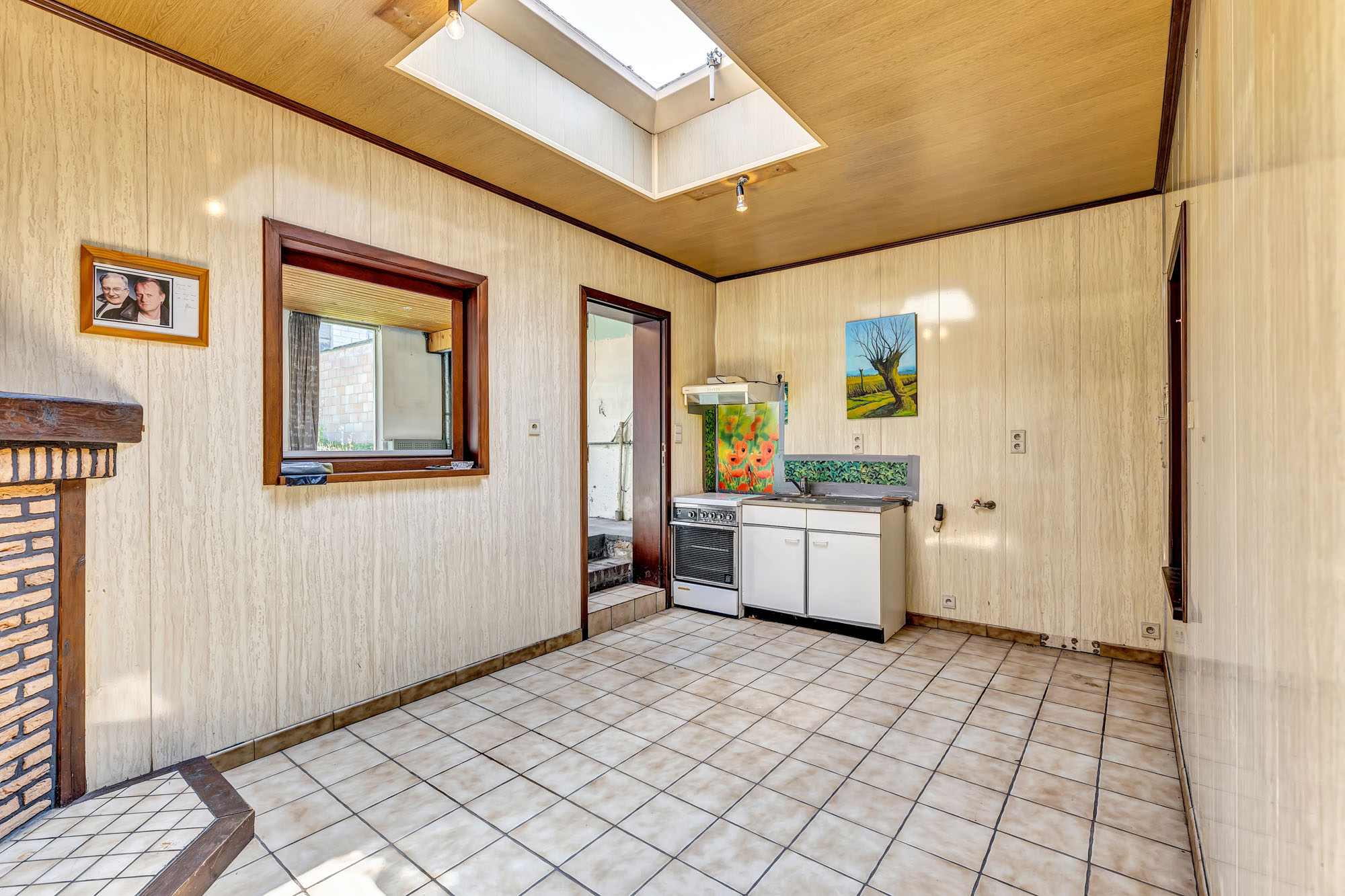 Te renoveren woning met garage en tuin - foto 5