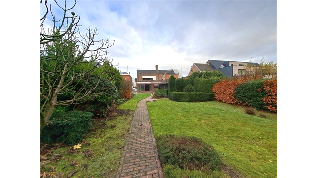 Een mooi afgewerkte en ruime woning met tuin - foto 2