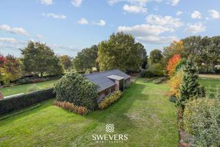 Op een volledig omheind perceel van 27 are in het groene Tessenderlo-Ham vind je deze instapklare open bebouwing. De woning, oorspronkelijk gebouwd...