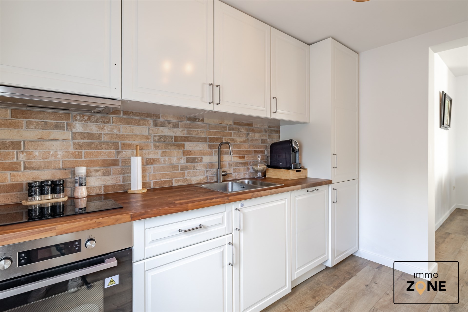 Karaktervolle handelswoning met ruim appartement in Hamme! - foto 4