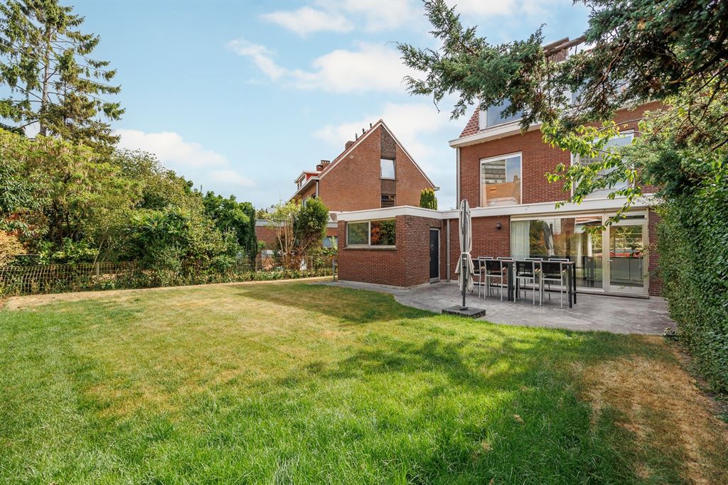 Unieke jaren 80-woning met ruime tuin - foto 4