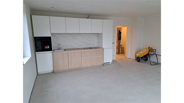 Een gelijkvloers nieuwbouwappartement met terras - foto 4