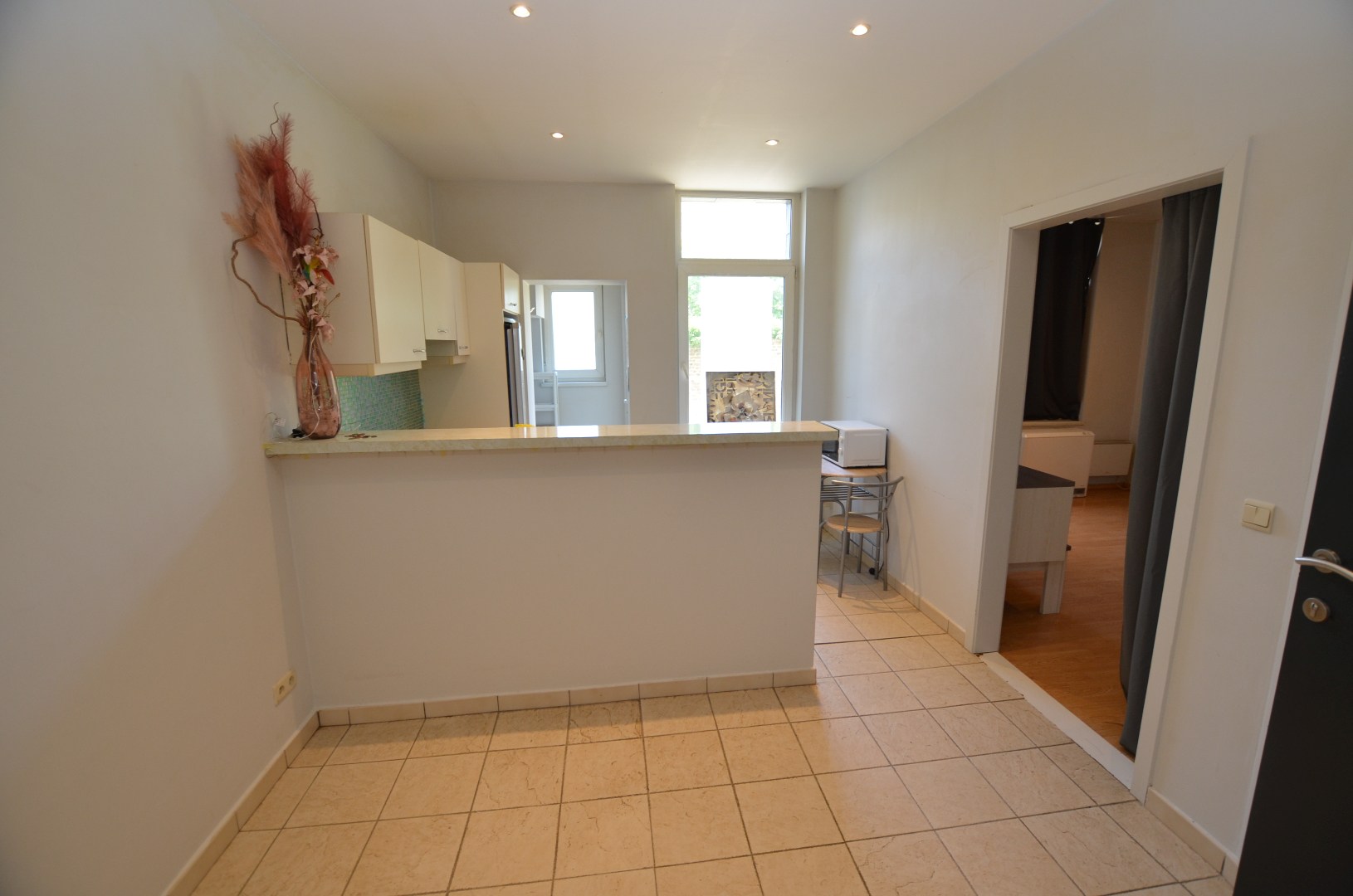 Gelijkvloers appartement met grote koer - foto 5