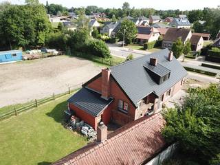 Deze gezinswoning ligt op een perceel van nagenoeg 7a. De tuin is zuidwest georiënteerd waardoor je volop kan genieten van de namiddag- en...
