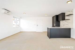 Instapklaar en energiezuinig appartement met tuin en uitweg in het hartje van Wevelgem Ben je op zoek naar een modern en energiezuinig appartement op...