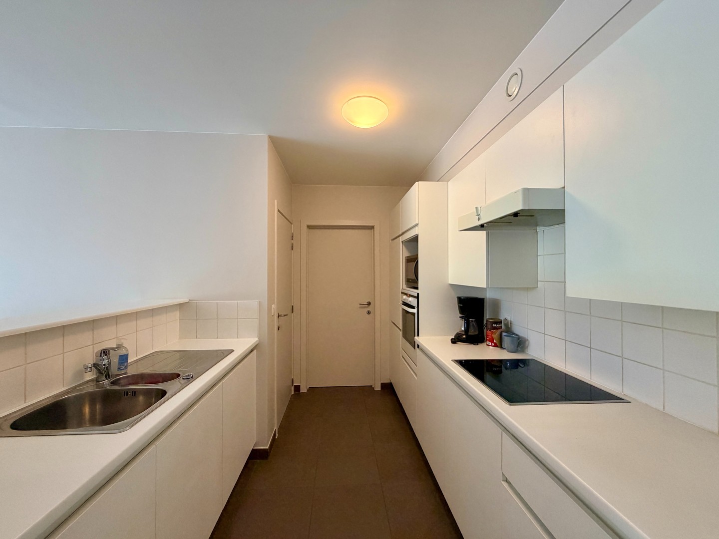Modern appartement met 2 slaapkamers, terras en garage op centrale ligging te Wakken! - foto 4