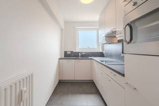 This bright and ready-to-move-in corner apartment is located on the second floor of the well-maintained Residence “Majestic”, a stone's throw from the seafront. Thanks to its southern orientation and convenient location, you can enjoy the sun and a unique, panoramic view of the dunes here. In addition, everything you need, from shops and cozy cafes to public transport (coastal tram), is within walking distance.<br /><br />Layout:<br />- entrance hall <br />- spacious living space with a beautiful view over the dunes<br />- installed kitchen<br />- bathroom with shower, sink and washing machine connection<br />- guest toilet<br />- bedroom 1 (13m²)<br />- bedroom 2 (9m²)<br />- terrace (3m²)<br /><br />Pluses:<br />- a few metres from the Zeedijk!<br />- recent facade renovation<br />- new windows on the front façade<br />- beautiful open view over the dunes<br />- EPC label B<br />- sunny south-facing apartment<br />- bright corner apartment (beautiful façade width) <br />- recently renovated entrance hall<br />- easily accessible with plenty of parking in the immediate vicinity.<br /><br />Are you looking for a two-bedroom apartment with an open view for sale in Middelkerke? Don't hesitate to book your appointment today!<br /><br />These AI visualizations are meant to inspire. Technical specifications, urban planning regulations or the concrete possibilities for realization were not taken into account.<br /><br />These AI visualizations are intended as inspiration. No technical specifications, urban planning regulations, or concrete realization possibilities were taken into account.