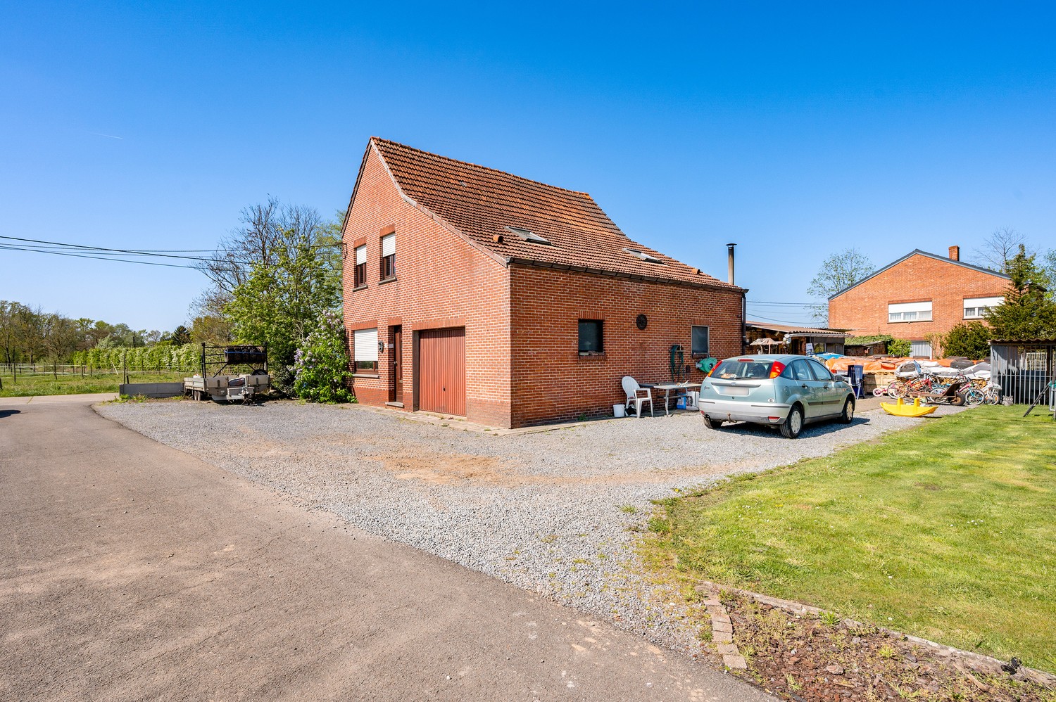Open bebouwing met ruime tuin en tal van mogelijkheden - foto 4
