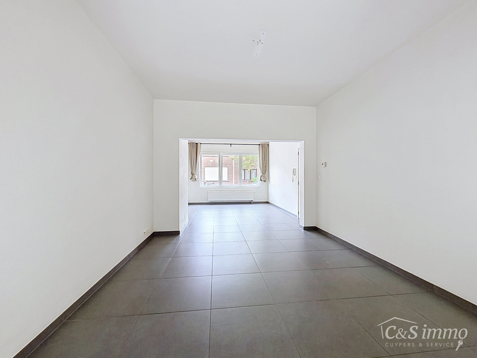 Instapklare woning met tuin opgedeeld in 2 entiteiten - foto 4