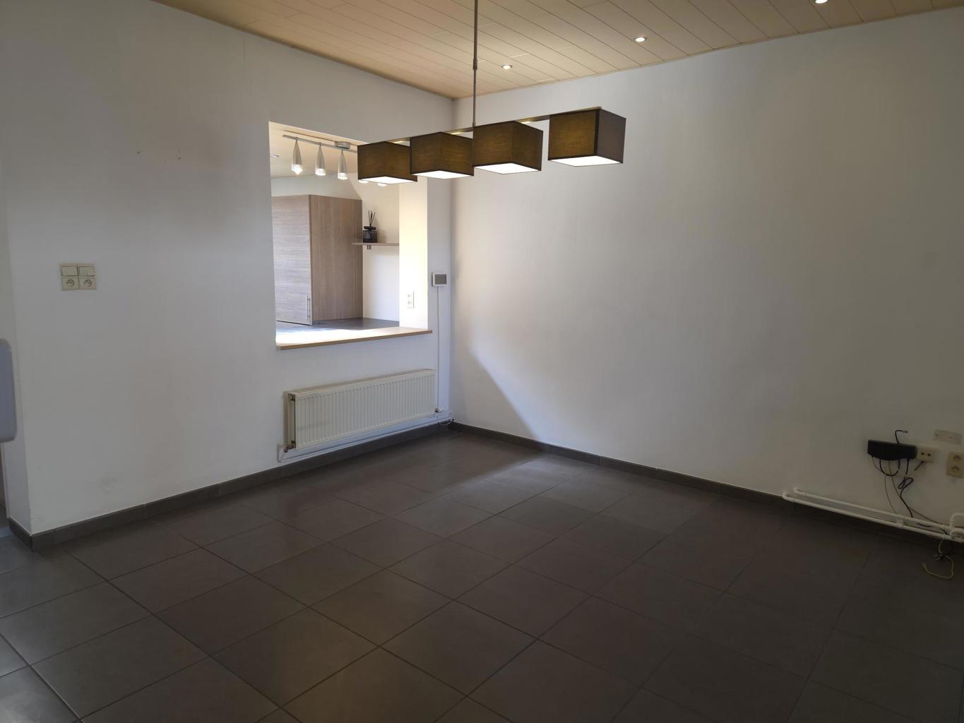 Halfopen bebouwing nabij centrum Arendonk met ruime tuin. - foto 4