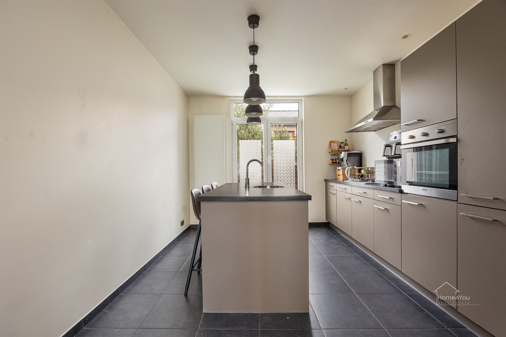 Instapklare woning met ruime tuin in Antwerpen te koop!  - foto 4