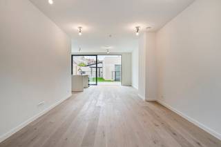 This stylish and very tastefully finished new-build home for rent is located in the Anuntiatenstraat in the center of Bruges in the quiet Saint-Gilles quarter. A few minutes' walk from the market, shops and public transport, yet quiet, which is unique in the city center.<br /><br />Layout<br />Ground floor:<br />- entrance hall with guest toilet<br />- living area with fully equipped open kitchen, finished with quality materials and appliances<br />- city garden with terrace<br />- storage space and stairs to the basement/garage<br />1st floor:<br />- bathroom 1 with bath, walk-in shower and double washbasin furniture<br />- bedroom 1<br />- bedroom 2<br />- toilet<br />- laundry and technical storage<br />2nd floor:<br />- master bedroom<br />- bathroom with walk-in shower and washbasin<br />- dressing<br />- attic room with roof window<br /><br />Advantages:<br />- comfort of a villa in the center of Bruges<br />- high quality finish<br />- parking under your own home<br />- BEN house<br /><br />Overall: <br />- Rental price: €1,750.00<br />- Available from: 01/09/2026<br /><br />