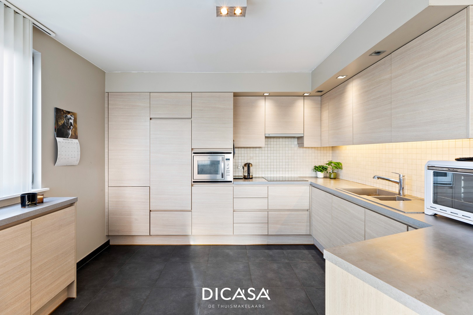 Lichtrijke duplex met zonnig terras en garage - foto 4