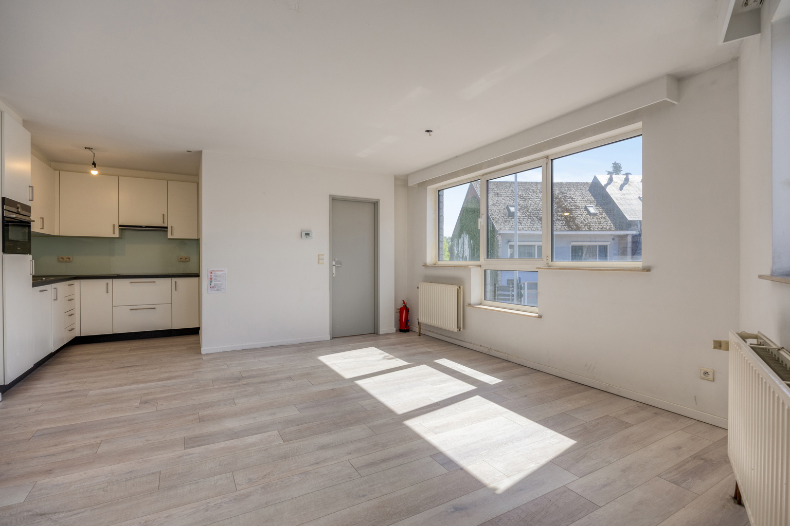 Centraal gelegen appartement met staanplaats - foto 2
