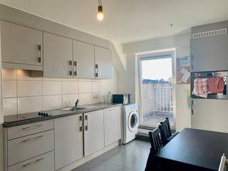 Modern duplex appartement met 1 slaapkamer, zuidgericht terras en garagebox op strategische locatie in Herentals. EPC: label B ...