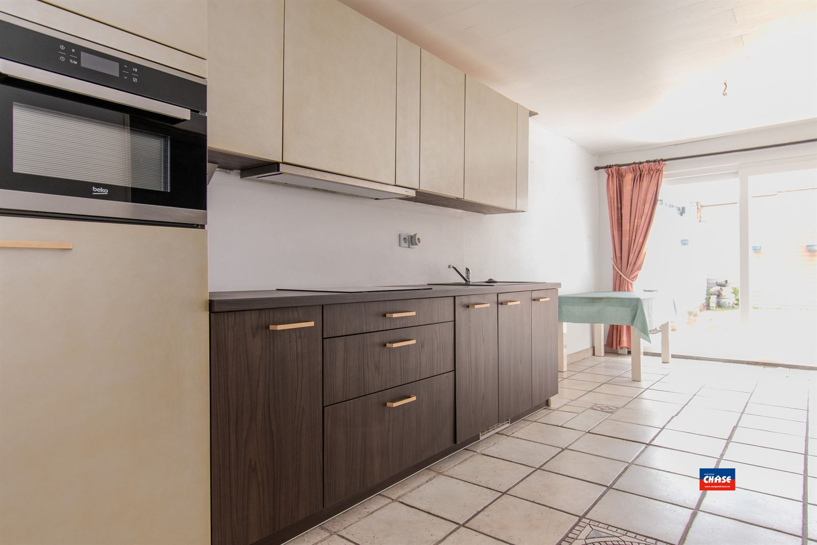 Rijwoning met 2 slpks en tuin - foto 4