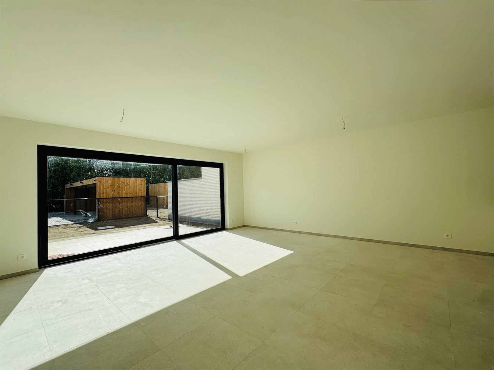 Gelijkvloers appartement met tuin, terras en autostaanplaats - foto 3