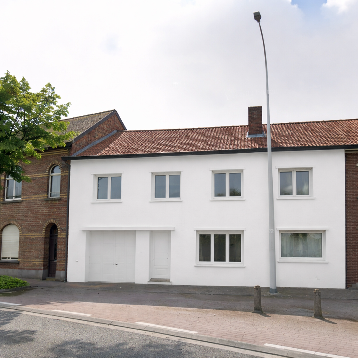 Handelshuis met woonst en ruime tuin - foto 2