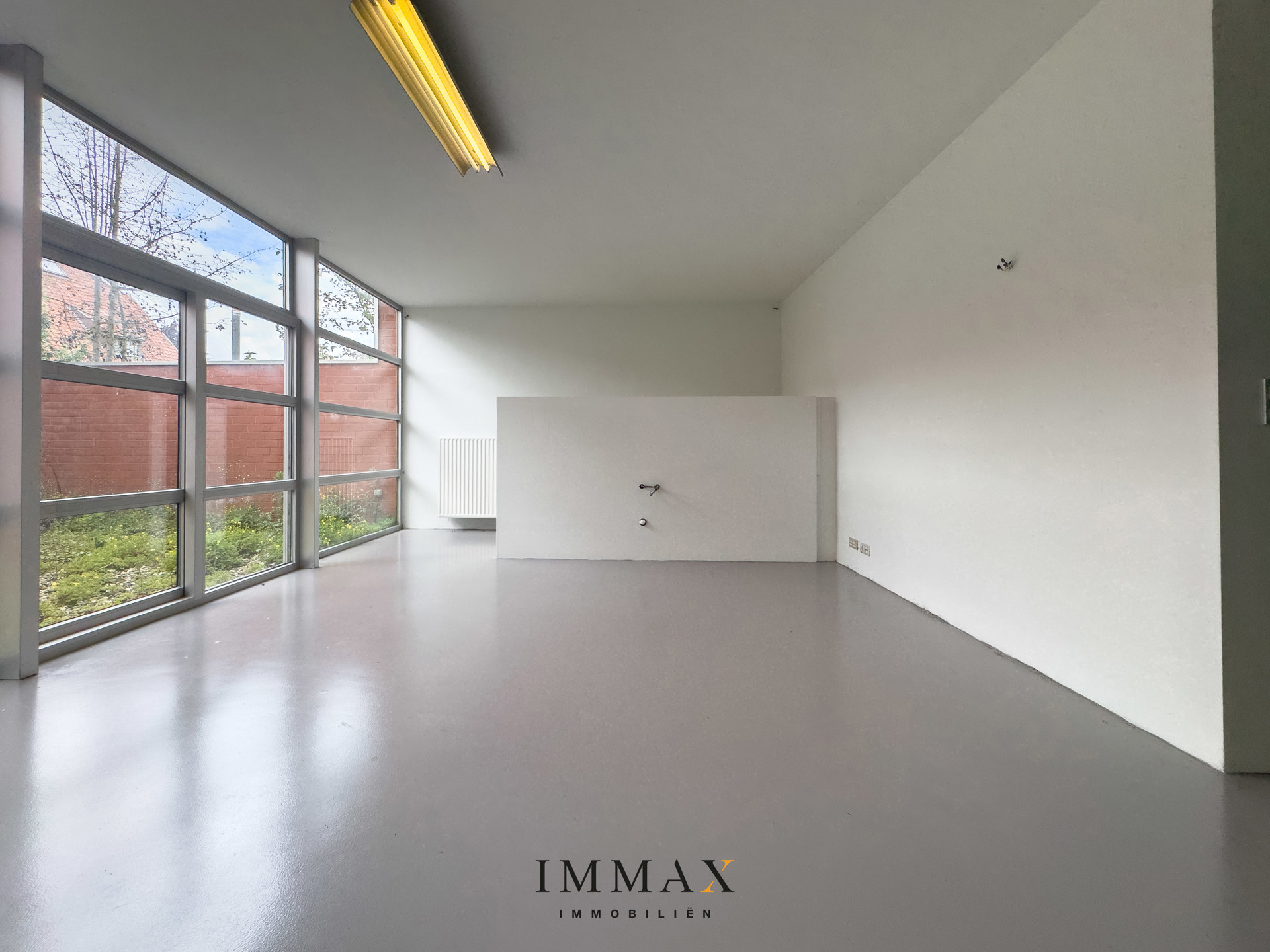 Exclusieve woonloft met royale leefruimtes en zicht op patio - foto 4