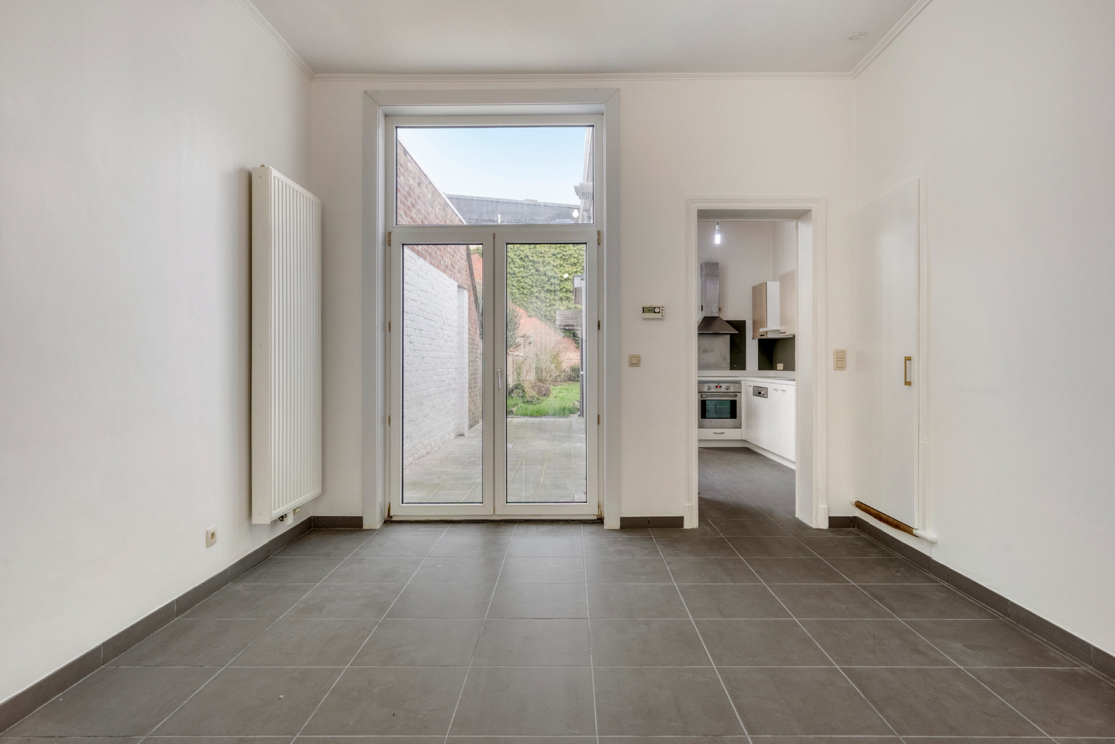 Gezellige instapklare woning met 3 (mogelijk 4) slaapkamers en ruime tuin in het centrum van Ieper - foto 5