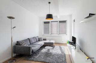 <p><span>The apartment is ideally located for those who love the vibrant city life: near the Marnixplaats and the Mechelseplein, within walking distance of the South and also the historic city center can be easily reached on foot. Furthermore, here you can benefit from a smooth connection to public transport and the velo-sharing system, and by car you can reach the highway in a few minutes. A top location for the city dweller who loves easy accessibility. </span></p><p><span> </span></p><p><span>The apartment is located on the second floor of a new construction project from 2013. It is located at the rear, making it extremely quiet and you almost forget that you are here in the heart of Antwerp. It is completely in order and achieves an extremely favorable EPC score so you can move in here without any worries. </span></p><p><span> </span></p><p><span>You enter in the hall, which runs through the apartment and provides the connection between all rooms.  The 2 bedrooms are 21 m² and 8 m² and opposite is the bathroom (4.5 m²), which is equipped with a washbasin cabinet, towel dryer and shower cabin. The toilet is separate. The living room with open kitchen has a nice surface of about’about 32 m² and the kitchen is equipped with all modern comforts: cooker, cooker hood, sink, built-in oven, dishwasher and fridge with freezer. From the living room you have access to the cozy terrace (5 m²).</span></p><p><span> </span></p><p><span>The fixed costs are €106/month and include syndic, elevator, block policy and maintenance of the common parts. Finally, there is an underground car parking space available, which is </span><span>obligatory </span><span>to purchase.</span></p><p><span> </span></p><p><span>Habitable surface area 86 m² ref. EPC certificate. For more info or a free estimate visit <span>www.hansimmo.be</span></span></p><p><span> </span></p>