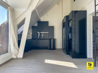 <p><span># Unique 1 bedroom penthouse for rent</span></p><p><span> </span></p><p><span>This impressive apartment of 70 m² located in Mortsel is an absolute eye-catcher with its special roof structure and modern design. </span></p><p><span>It is located in a very quiet and convenient location close to the center of Mortsel and between Mortsel and Hove station. Everything is quickly accessible.rt. Highly recommended for those looking for a modern, compact lived-in space with character and style.</span></p><p><span> </span></p><p><span> </span></p><p><span>The property features a spacious open living area that is perfectly crafted. The living area is characterized by high sloping walls and impressive large windows that maximize light and a very airy feel. The windows offer direct access to a magnificent terrace overlooking a peaceful green area.</span></p><p><span> </span></p><p><span>The open kitchen side of the home is equipped with beautifully lacquered cabinets and modern appliances. This creates a stylish unit that perfectly complements the overall design of the apartment. The kitchen functionality is maximized in the available space.</span></p><p><span> </span></p><p><span>The bedroom features a large window for plenty of natural light. A built-in closet offers plenty of storage space. Adjacent to the bedroom, this apartment has a modern fitted bathroom with shower and sink unit. The toilet is located in the hallway.</span></p><p><span>The apartment also has provision for washer and dryer.</span></p><p><span> </span></p><p><span> </span></p><p><span>Need for an extra office space then this can be done with the stairs to the mz</span></p><p><span> </span></p><p><span>The terrace is a real highlight of this property. With a spacious area and protected by a modern railing, it offers a perfect place for relaxation with a nice view of the neighborhood. Access to this terrace enhances the sense of space and light throughout.</span></p><p><span> </span></p>