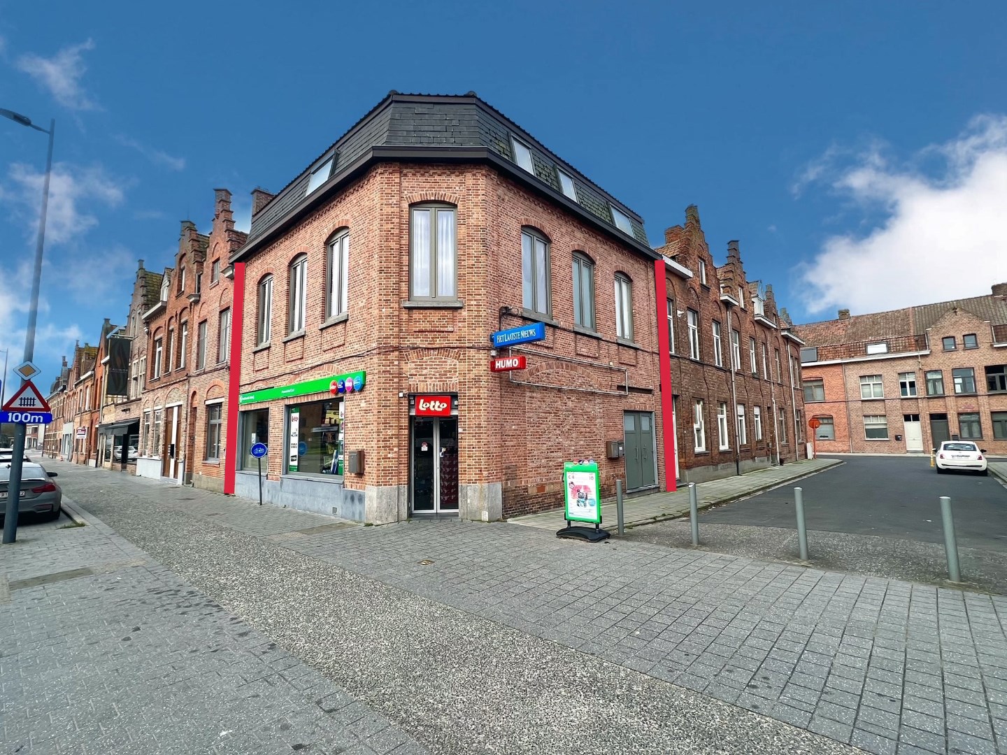 OPBRENGSTEIGENDOM BESTAANDE UIT HANDELSGELIJKVLOERS EN 2 APPARTEMENTEN - foto 1