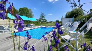 Droomt u van ruimte, luxe en rust te midden van het groen? Dan is deze uitzonderlijke designvilla precies wat u zoekt. Gelegen op een prachtig...