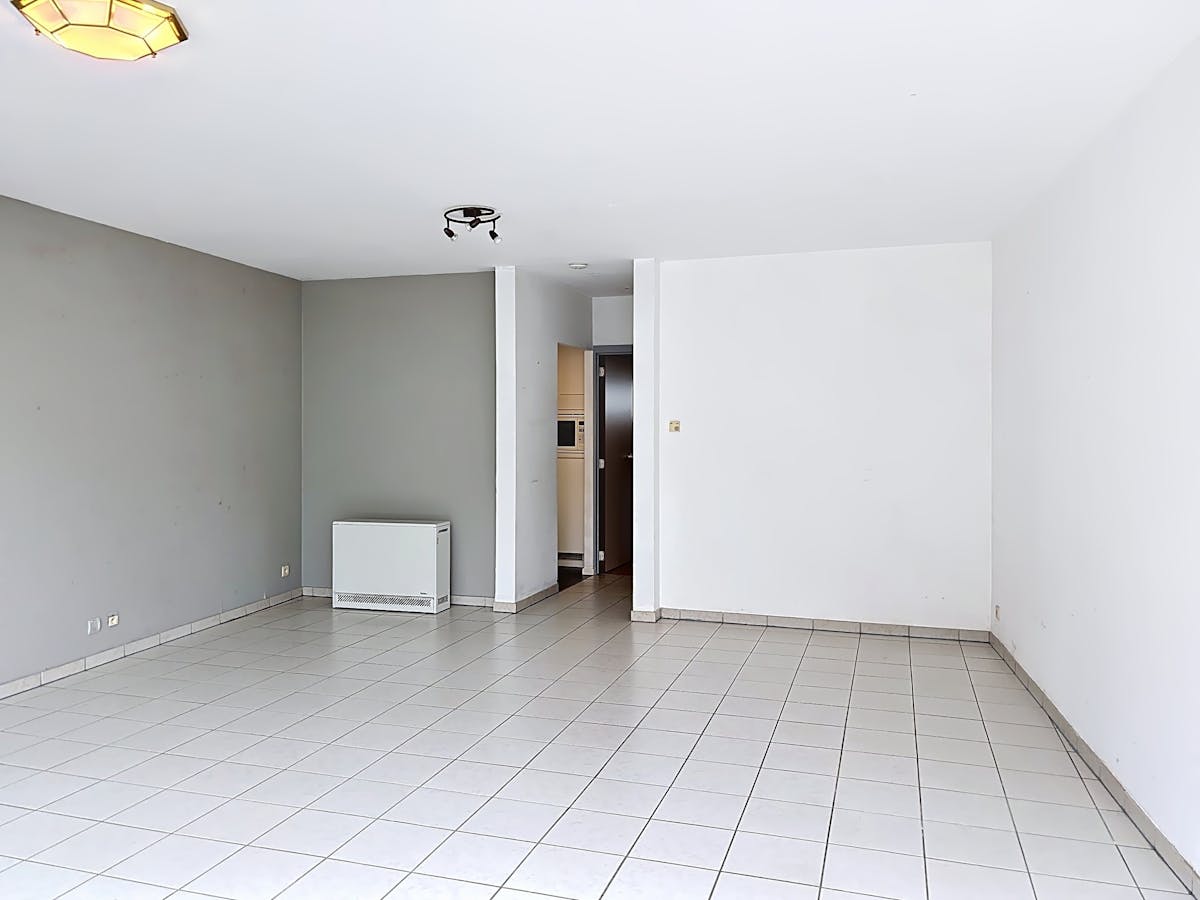 Instapklaar gelijkvloers appartement met gemeenschappelijke tuin en fietsenberging in hartje Kapellen! - foto 5