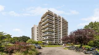 <p><span>Welcome to this spacious and bright </span><span>138 m²</span><span>corner apartment </span><span>, located on the 8th floor of the iconic </span><span>Hertogenpark residence</span><span>. With its exceptional location, three terraces, and unobstructed views, this apartment offers a unique combination of space, comfort, and quality of life. An underground parking space and a private basement storage unit are included.</span></p><h3><hr /><span>Location</span></h3><p><span>The apartment is located at </span><span>Desguinlei 90 in 2018 Antwerp</span><span>, in a particularly prestigious and architecturally distinctive building designed by </span><span>Walter Bresseleers</span><span>. The Hertogenpark residence is known as a luxurious residential concept where comfort and quality take center stage.</span></p><p><span>The building’s entrance hall immediately evokes a hotel-like atmosphere and offers numerous exclusive amenities, such as an </span><span>indoor swimming pool, a sauna, and guest rooms</span><span>. Thanks to its excellent location, you can enjoy peaceful living here with a view of the greenery of the </span><span>Hertoghe Estate</span><span>, while major access roads, public transportation, and city amenities are nearby.</span></p><h3><hr /><span>Layout</span></h3><p><span>You can reach the apartment on the 8th floor via one of the four elevators. Upon entering, you’ll find yourself in a spacious entry hall with a separate restroom and coat closet.</span></p><p><span>Adjacent to this is the impressive living area of approximately </span><span>60 m²</span><span>, where large windows provide an abundance of light and a beautiful, unobstructed view over the treetops of the Hertoghe Estate. The living area provides direct access to </span><span>two terraces</span><span>, totaling 22 m², where you can enjoy the sun and tranquility all day long.</span></p><p><span>Adjacent to the living area is the </span><span>enclosed, renovated kitchen</span><span>, fully equipped and practically laid out. Next to the kitchen is a utility room with space for a washer and dryer.</span></p><p><span>The apartment also features </span><span>two bedrooms</span><span>, each with its own bathroom. Both bedrooms open onto a </span><span>third terrace</span><span>, providing extra light, privacy, and outdoor space.</span></p><h3><hr /><span>Key Features at a Glance</span></h3><ul><li><span>Iconic residence designed by Walter Bresseleers </span></li><li><span>Prime location at the Domein Hertoghe (Antwerp) </span></li><li><span>138 m² of living space with an exceptional sense of spaciousness </span></li><li><span>3 terraces (total 22 m²) </span></li><li><span>Stunning views and plenty of natural light </span></li><li><span>2 bedrooms, each with its own bathroom </span></li><li><span>Luxury residence with a pool, sauna, and guest rooms </span></li><li><span>Favorable EPC </span></li><li><span>Underground parking space and private basement included </span></li></ul><p><span>Exclusive and peaceful living with hotel-style amenities</span></p>