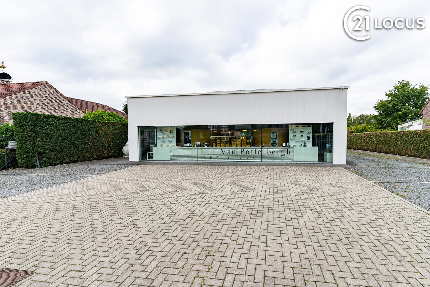 Handelsruimte met woonst &amp; 6 parkings te koop in Kruibeke - foto 2