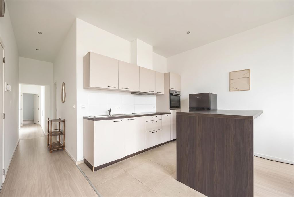 Lichtrijk appartement op het bovenste verdiep - foto 4