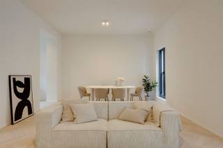 <p><strong>Beautiful new apartment on the South</strong></p><p><strong> </strong></p><p>Do you dream of a top apartment on bustling South? The neighborhood that is always alive? Discover with us residence Antoine, located in the Scheldestraat between the Marnixplaats and the Zuidpark. Here you live within walking distance of the Museum of Fine Arts, the Scheldt Quays and with the best coffee bars and terraces just around the corner. In no time at all on the Antwerp ring road or in the center of the City.</p><p> </p><p>-<span><span> </span> Top location and hippest neighborhood in Antwerp</span></p><p>-<span><span> </span> Possibility to buy at 6% VAT</span></p><p>-<span><span> </span> Cozy covered terrace</span></p><p>-<span><span> </span></span><span> </span> Elevator and underground bicycle storage available</p><p>-<span><span> </span> Almost energy neutral (heat pump, solar panels, underfloor heating, ... )</span></p><p> </p><p>The apartment is located on the second floor of a small new building. Via the elevator or stairs you reach the floor.</p><p> </p><p>The high ceilings, beautiful herringbone parquet and high quality finish immediately catch your eye. This is where you want to live, this is where you won't want to leave. There is a large living space with access to the terrace through the sliding window. The kitchen is connected to the dining area of the living space. Also a master bedroom and guest room with a shared bathroom with large walk-in shower. There is another separate storage room with all technology and connection for washer and dryer.</p><p> </p><p><span> </span>You can store your belongings bikes in the basement storage room and bike shed.</p><p> </p><p>The project consists of 5 spacious and bright apartments with 2 bedrooms and</p><p>terraces.</p><p> </p><p>Plan your visit at www.sinjoor.be or call us for more information 03 283 05 00.</p>