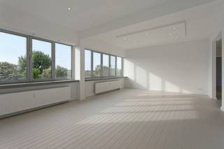 Renovated Three-Bedroom Apartment with Terrace and Panoramic Green ViewsEntrance hall with cloakroom and guest toilet with hand basin. Access to a...