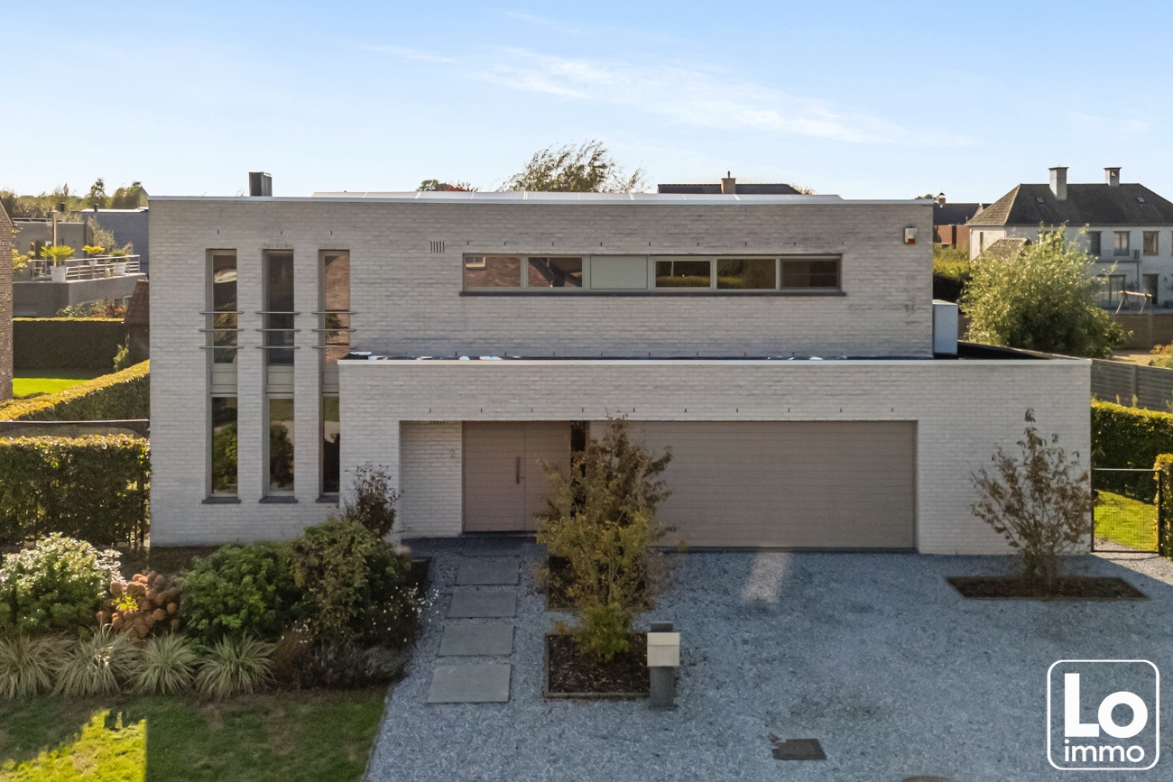Instap klare moderne open villa met dubbele inpandige garage en een gezellige tuin op een toplocatie nabij het centrum van Lochristi! - foto 1